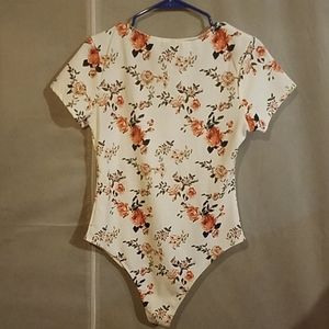 Rue21 Tops - Floral one piece bodysuit Rue21 Tops - Floral one piece bodysuit